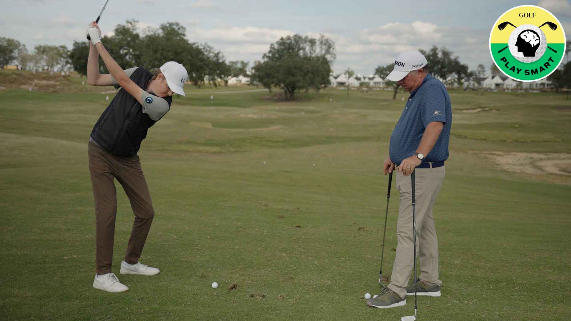 golf.com editor zephyr melton swings while instructor tony ruggiero watches