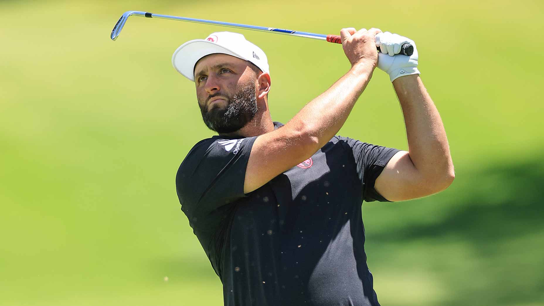 LIV pro Jon Rahm plays a shot on during the LIV Golf Andalucia event in 2024.