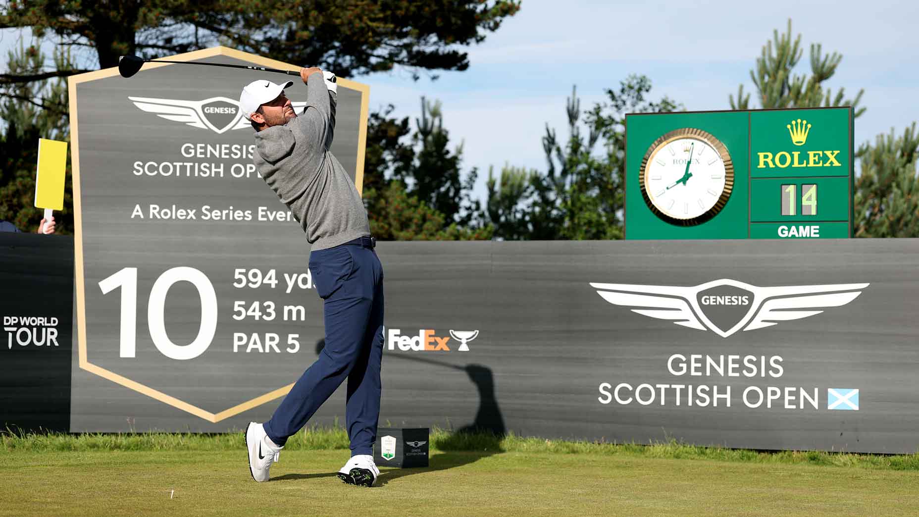 PGA Tour pro Scottie Scheffler hits shot before the 2025 Genesis Scottish Open at the Renaissance Club.