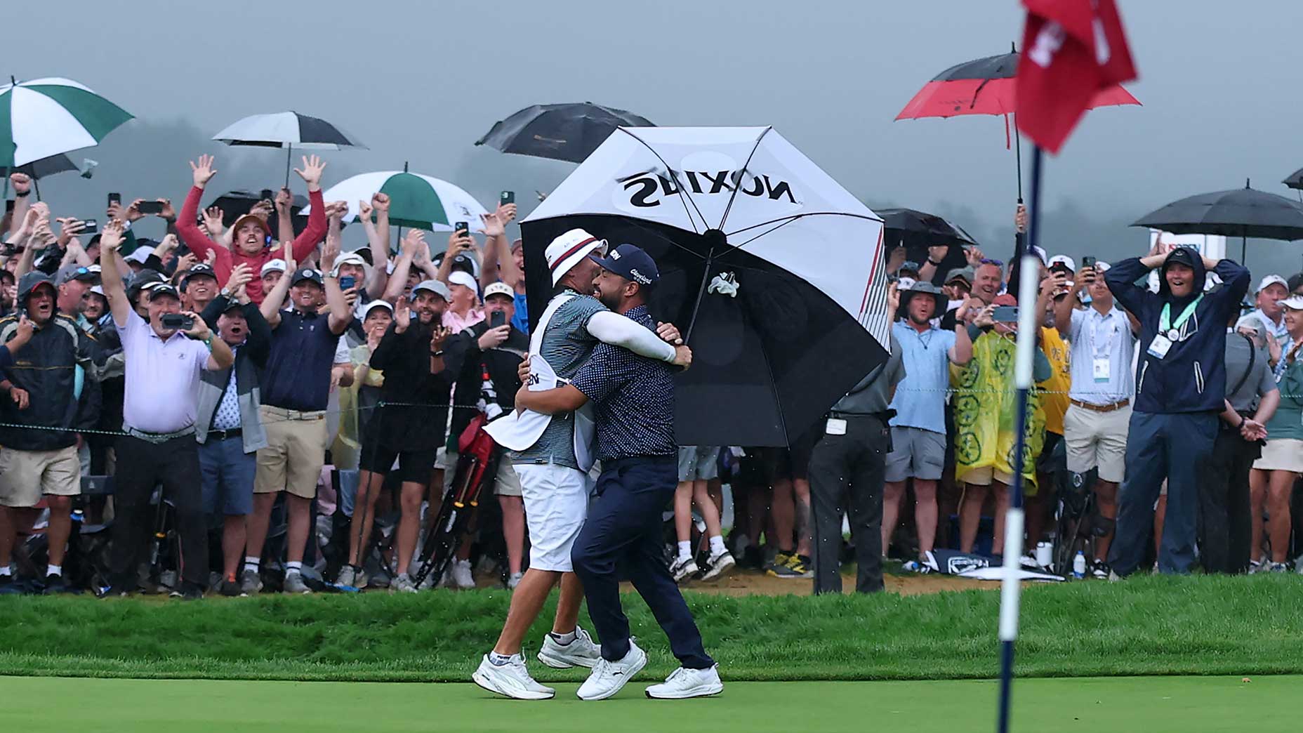 J.J. Spaun and caddie Mark Carens celebrate Spaun's 2025 U.S. Open title on Sunday at Oakmont Country Club.